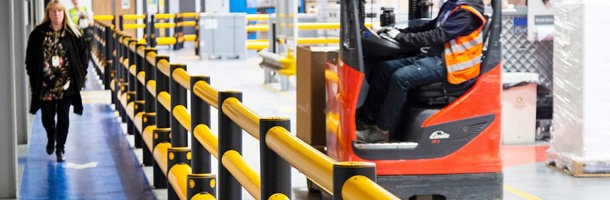 Industrial Polymer Pedestrian Safety Barriers Protecting Walkway from Forklift Impacts