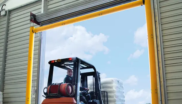 Height Restriction Barriers Protecting Warehouse Entrance from Forklift