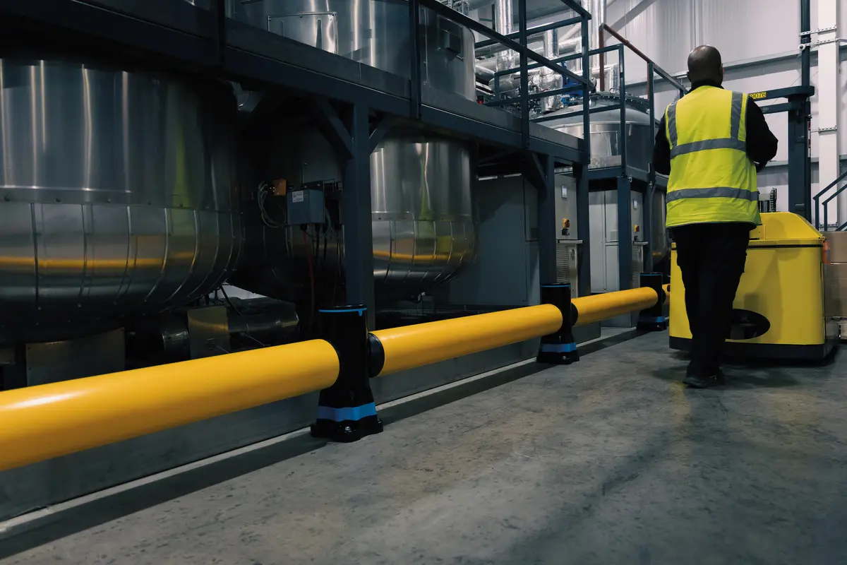 A-SAFE impact barriers installed around machinery and equipment.
